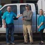 Keys to a donated truck are handed off to the city of Carey's Public Works Director, Steven Grigsby.